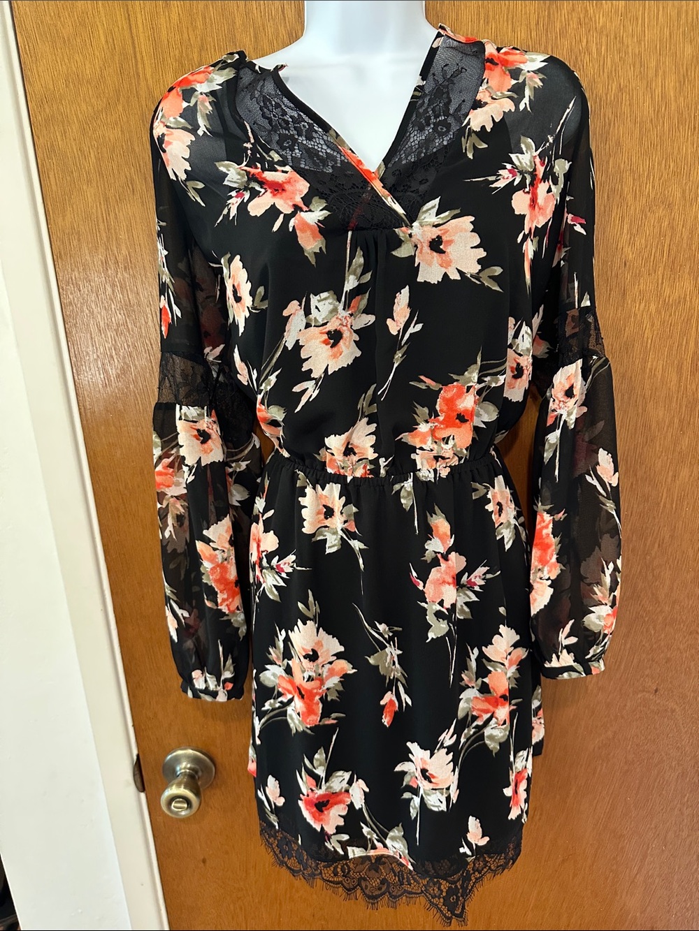 White House Black Market dress size 4, long sleeved, elastic at waist, floral.